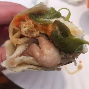 Chile relleno burrito with beans. Fresh tortillas are amazing and had to get extra hot sauce!! One of my favorite places in El Paso.