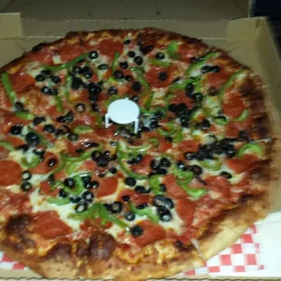 Extra Large Pepperoni, green pepper, and olive pizza.