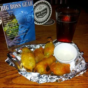 a plate of fried food and a drink