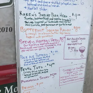 a menu on the side of the truck