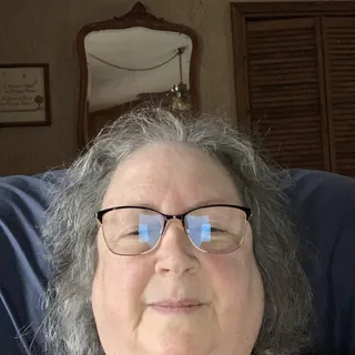 Sandi C.