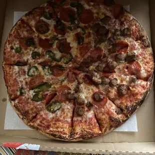Large pizza with pepperoni,sausage, and jalapeños