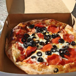 mini-pizza $3.81 for 2-toppings and that includes tax.