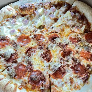 Half meat lovers half Hawaiian Pizza