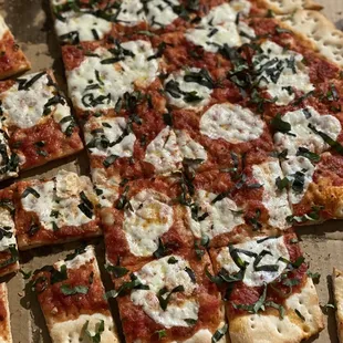 Margarita pizza. Decent flavor and the wafer like crust is very good