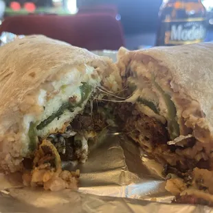 Chile relleno burrito with Al pastor.