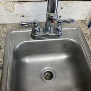 This hand washing sink is nasty