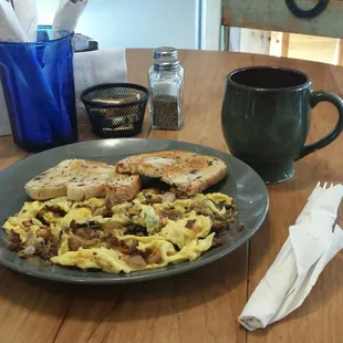 MN Scramble, cranberry wild rice toast, flavorful cup of coffee.