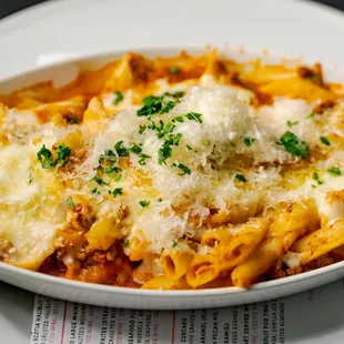 Baked Ziti served with house made sauce and baked to perfection