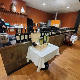  woman standing behind a counter in a restaurant