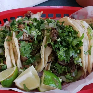 Tacos! From L to R: lengua, carnitas, barbacoa, tripas