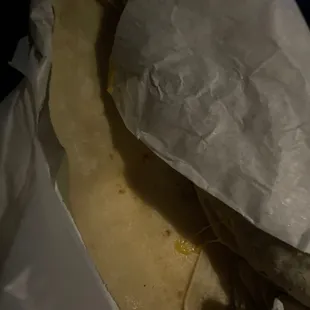 a burrito wrapped in paper