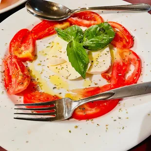 a plate of food with a fork and knife