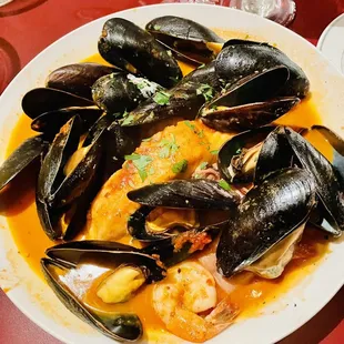 a plate of mussels and shrimp