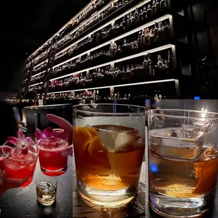 a variety of cocktails on a bar counter