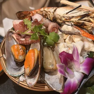 Steamed seafood over rice