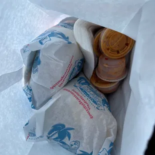 Shrimp and Cali burritos to go with extra red sauce on the side.