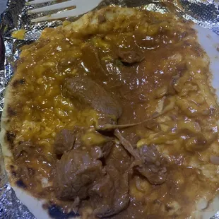 Carne guisada with cheese