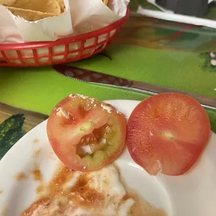 Unripe tomatoes served on tacos.