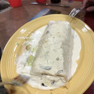 Burrito in creamy chipotle sauce. See the forks were in attack mode... I barely got the pic taken before first bit. ;D