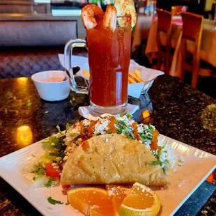 a plate of food and a drink