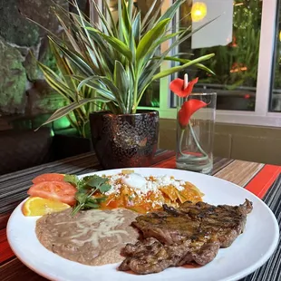 Carne Asada con chilaquiles rojos