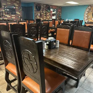 a table and chairs in a restaurant