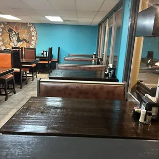 empty tables and booths in a restaurant