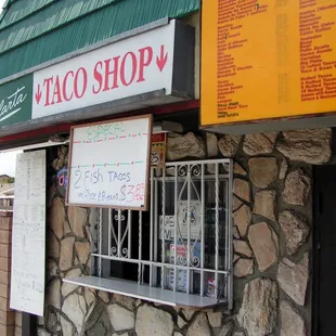 a sign for a taco shop