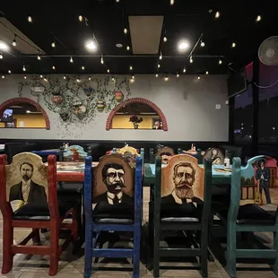 Decor, chair backs have vintage style people art on them, Vallartas Mexican Resyauranr, Lutz, n tampa