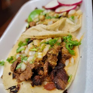 Pastor tacos 3/5: good but i think the tortilla over powered the tasty meat but thats just me