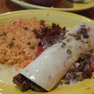 Burrito Regio. A burrito filled with steak and covered with Chori-queso. A delicious effort here.