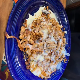 La Peluza - grilled chicken with queso over rice