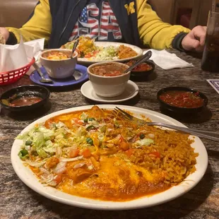 lunch cheese Enchiladas with added rice and whole beans.  Also 2 chicken tacos also added rice and whole beans.