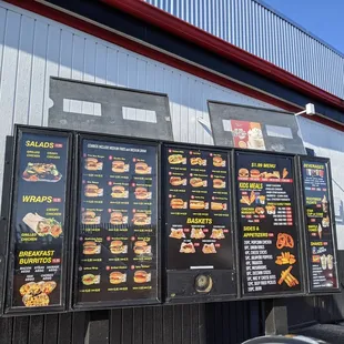 menus on the side of a building