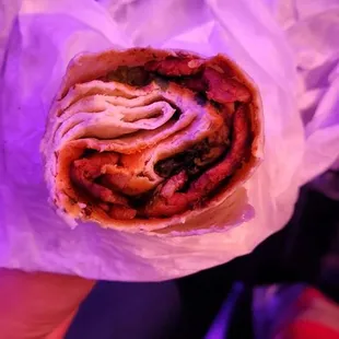 Al pastor burrito I ordered. More like a tortilla with little meat. They forgot everything that makes a burrito a burrito