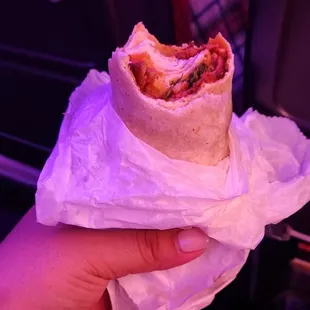 My burrito. They forgot to add beans, rice, everything that makes a burrito. Was sad to open this on the 11 hr plane ride