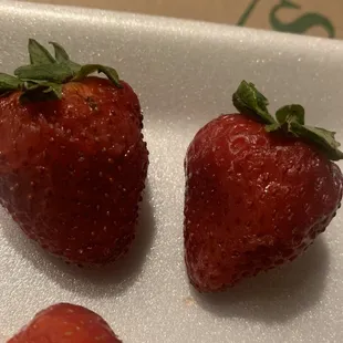 The rotten underside of the strawberries they topped the cake with.