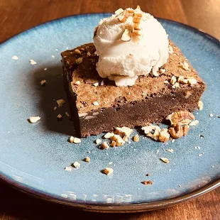 This chocolate brownies  is rich and luscious with creamy  gelato topped with crunchy walnut. The perfect dessert!