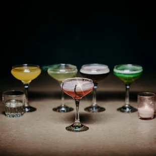 a variety of cocktails on a table