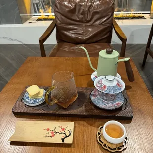 Tea set with pineapple cakes.