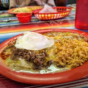 Christmas enchiladas de res with an egg; those beans and rice are not mere side notes, either.
