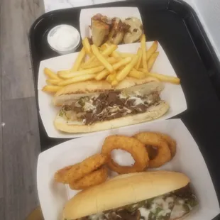 two hot dogs and french fries