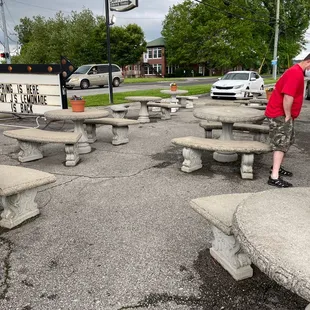 a man standing in a parking lot