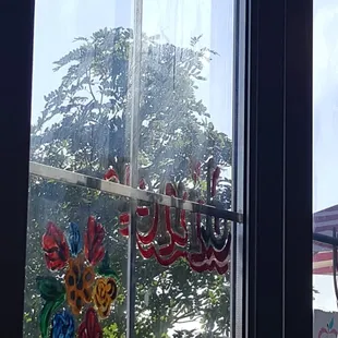 Dirty greasy window that match the super sticky floors.