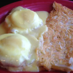 Eggs Benedict with hash browns. 8 out of 10