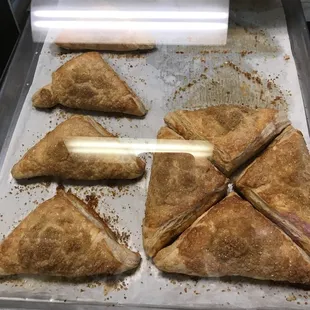 a tray of pastries being made