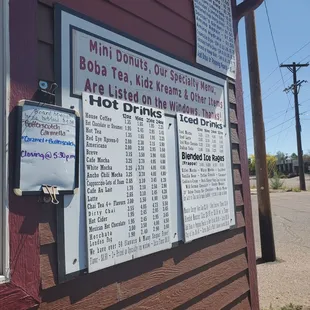 menus on the side of a building