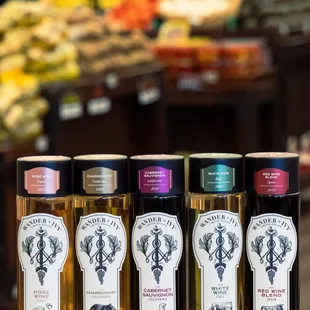 a variety of bottles of olive oil