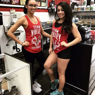 two women standing in a store